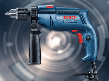 Máy khoan Bosch GSB 550 - Gồm hộp giấy, tay cầm, thước chặn